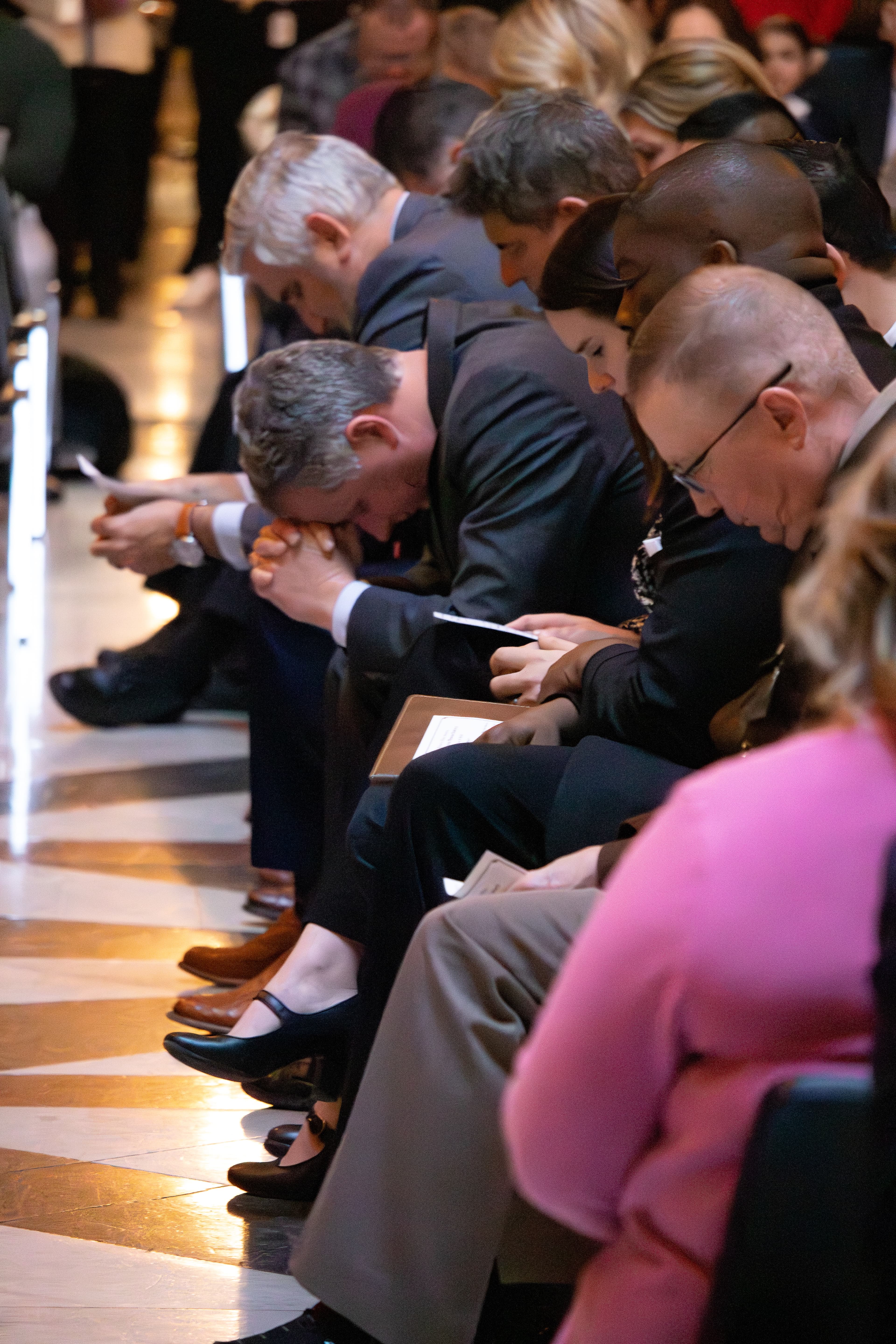 Attendees praying at the 21st Annual Statehouse Prayer Service