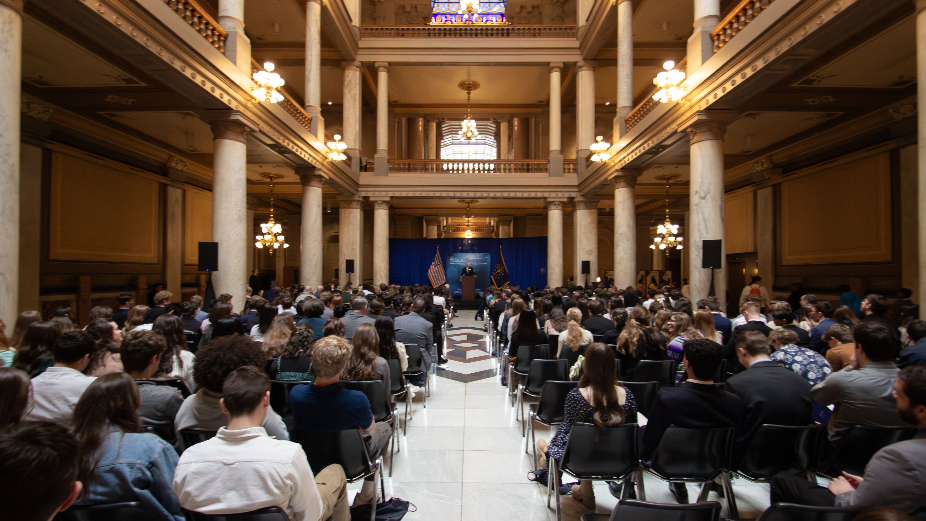 Statehouse atrium filled with students