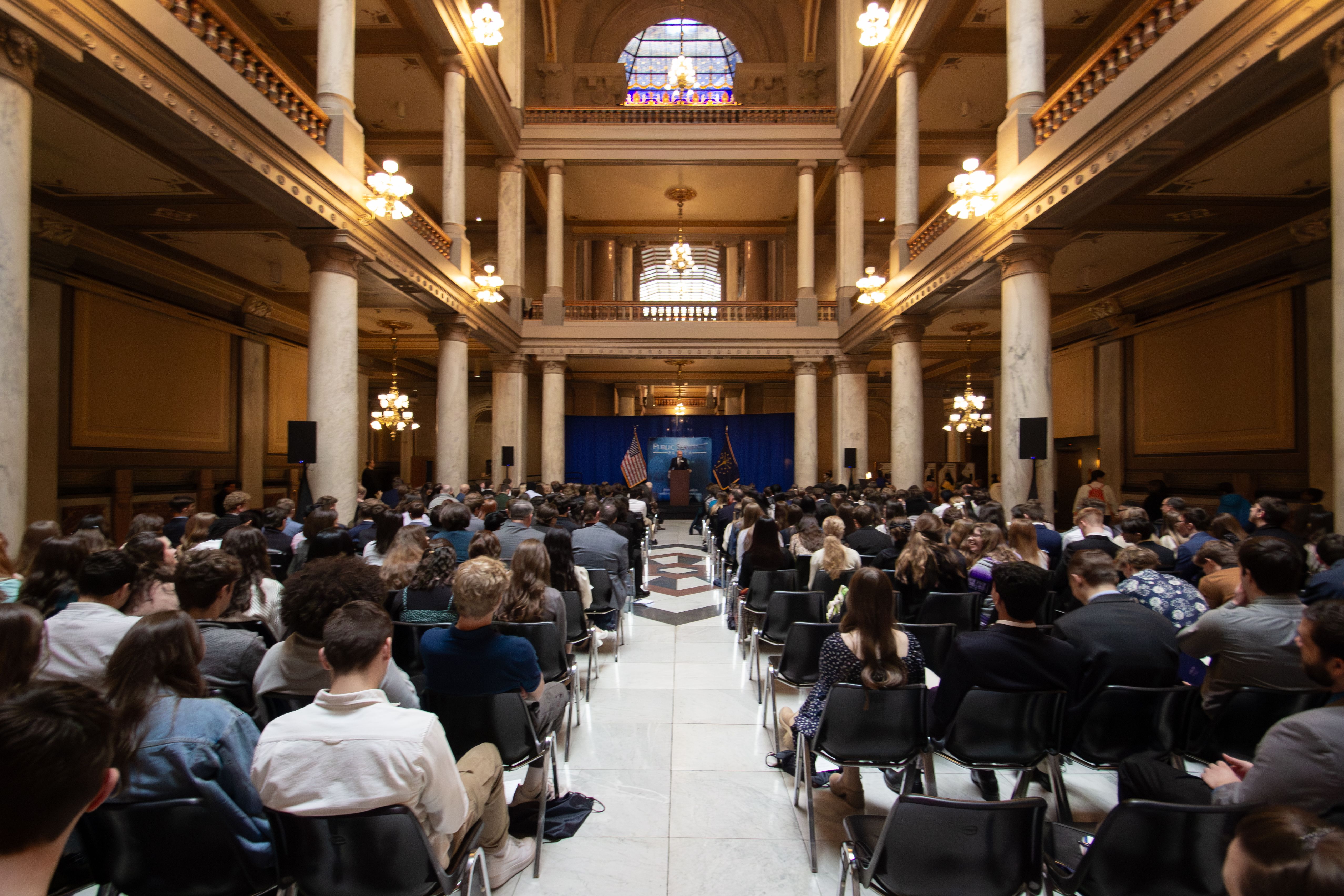 Statehouse atrium filled with students