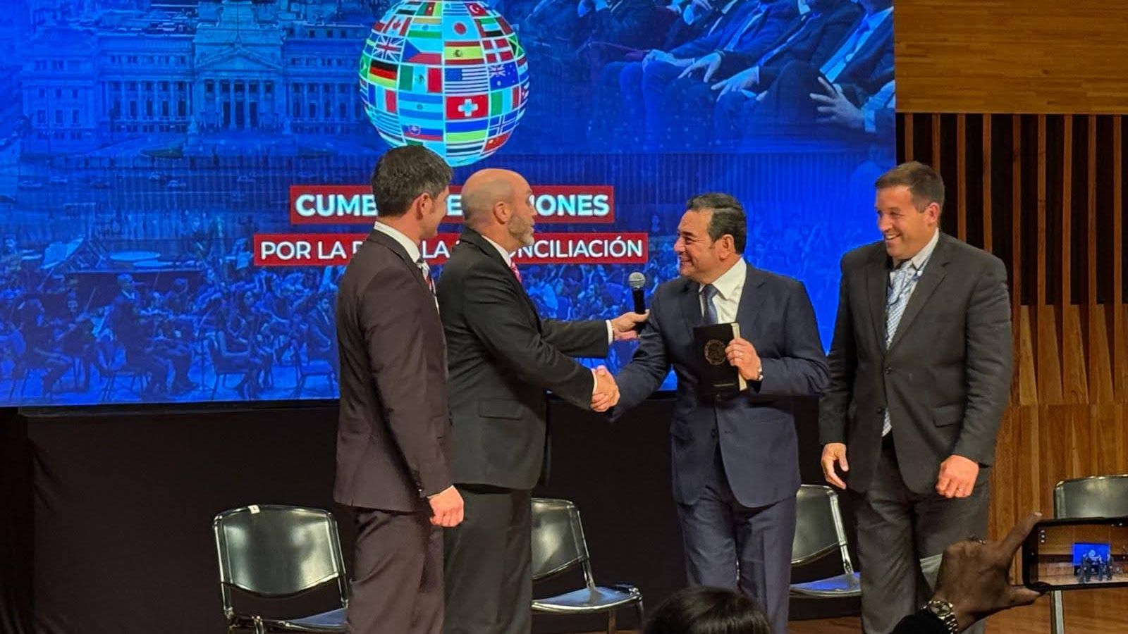 Presenting Bible to President Morales
