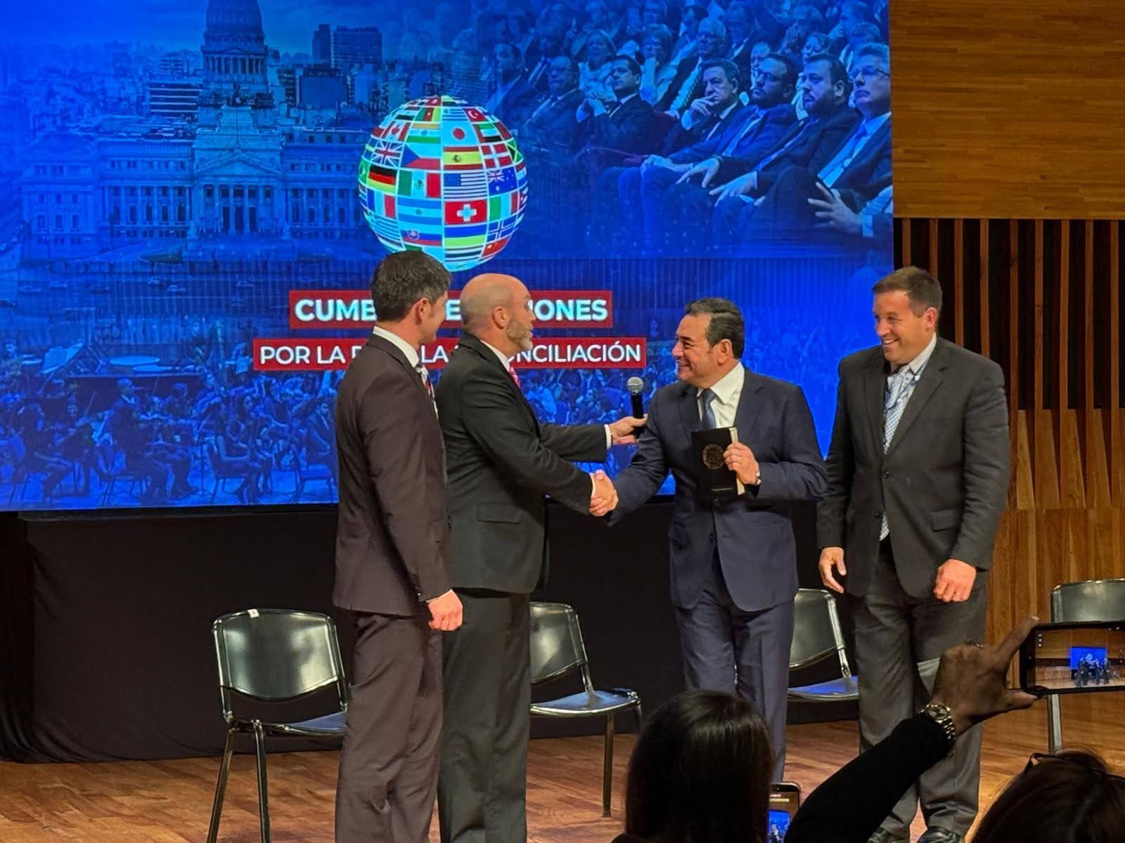 Presenting Bible to President Morales