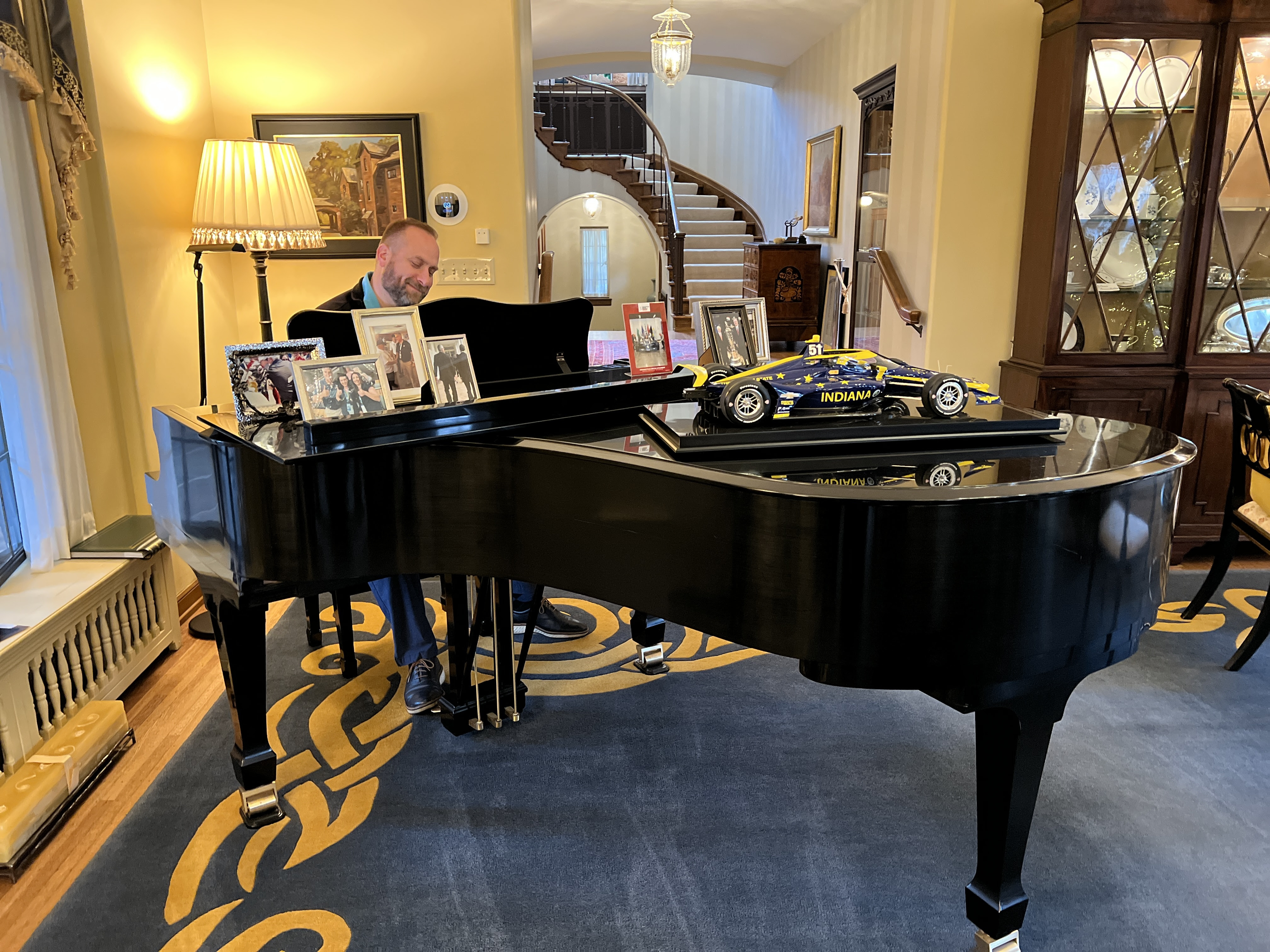 Tim playing the piano at the Governor's Residence